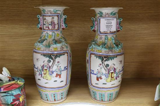 A Chinese crackle glaze bowl and jar, a pair of famille rose vases and two stone china plates